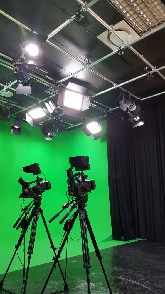 The TVL CYC RGBW cyclorama wall wash is used to light the studio’s green infinity wall