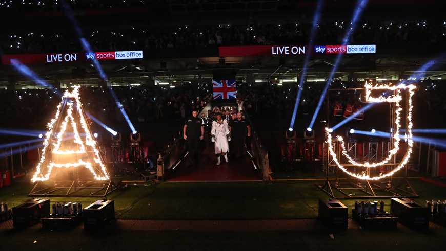 Anthony Joshua enters the arena