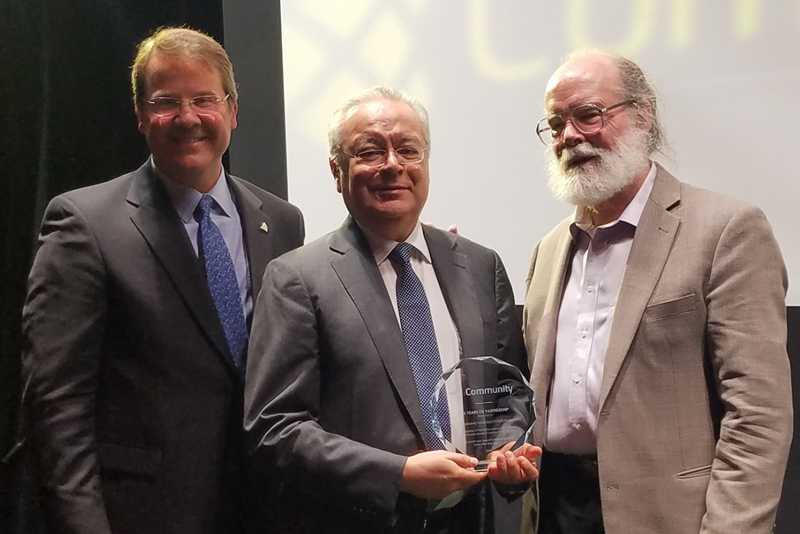 Community's CEO, Steve Johnson, Ampere Manufacturas Electrónicas' DG Jaime Celis, Community's president and founder, Bruce Howze