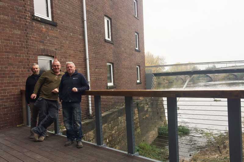 Site contractor Colin Wilson, contractor Paul Ellis and volunteer John Bell