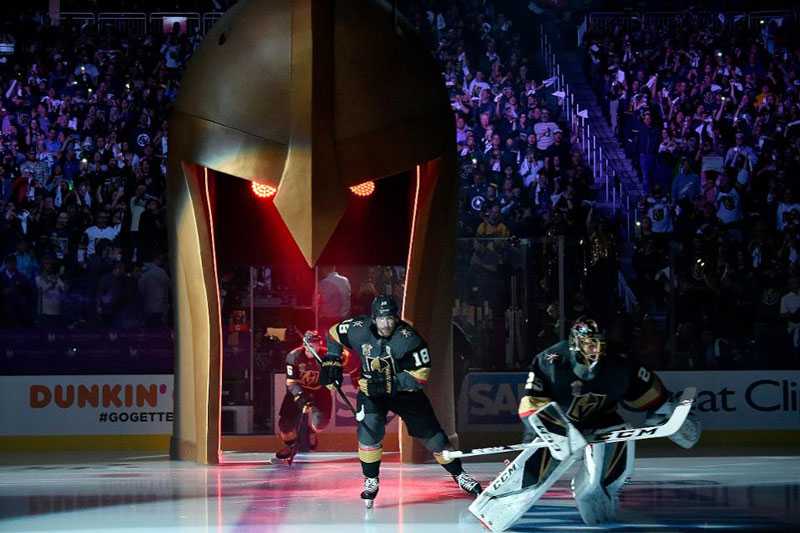 The Vegas Golden Knights team now enters the ice through a 20ft medieval jousting helmet The Vegas Golden Knights team now enters the ice through a 20ft medieval jousting helmet