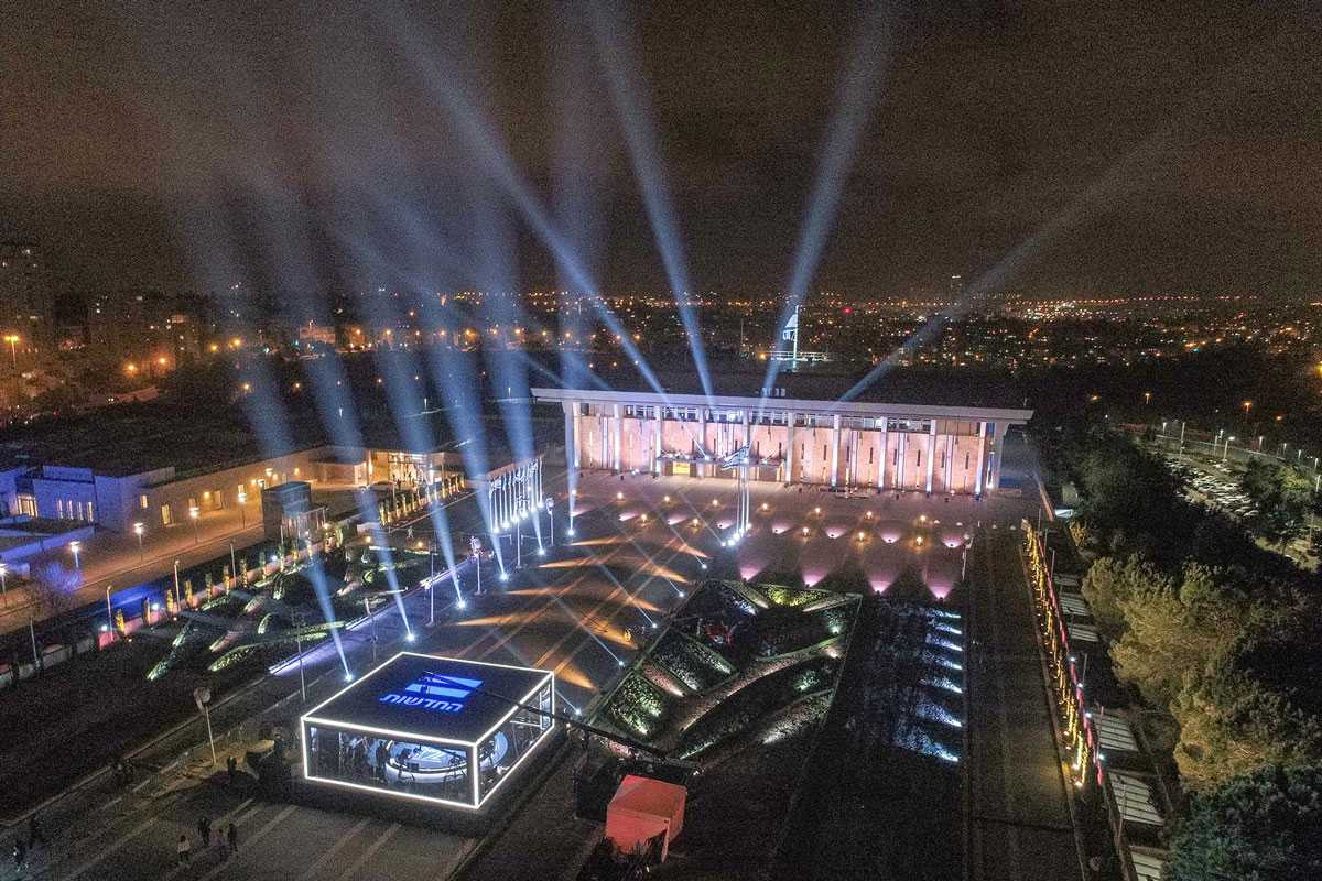 Channel 12 built a pop-up studio in front of Israel’s Parliament building, the Knesset Channel 12 built a pop-up studio in front of Israel’s Parliament building, the Knesset