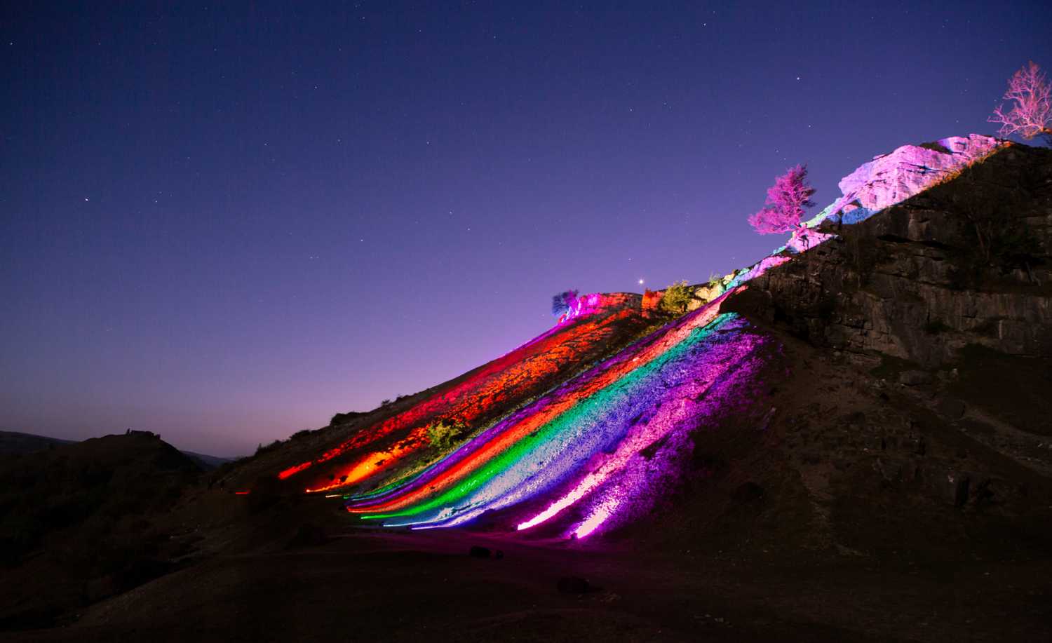 The all-volunteer group illuminated the hills and castle in vivid colours (photo: Eastwood Media)