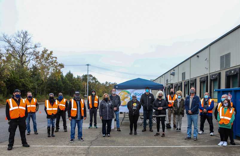 Volunteers delivered boxes of food to 100 families at a drive-thru event at Bandit’s Nashville base