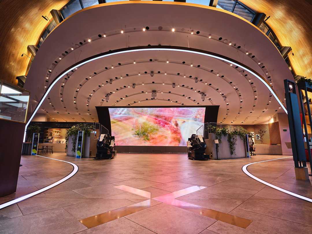 The facility features a 32ft Screenmax LED display wall