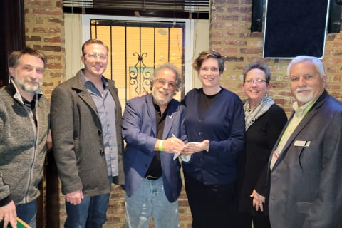 The official signing of the napkin! - Elmer Veith (ESTA secretary), Todd Spencer (ESTA president), Bill Sapsis (NATEAC director emeritus), Erin Grabe, Tracey Cosgrove and Steve Surratt (ESTA executives)