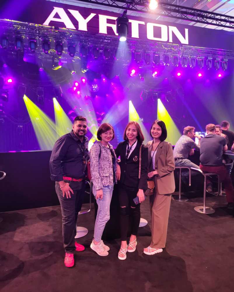 Ayrton's Vijay Thaygarajoo, ProAVL's Huong Nguyen, Ngoc Truong and Loan Tran on the Ayrton booth at Prolight and Sound 22