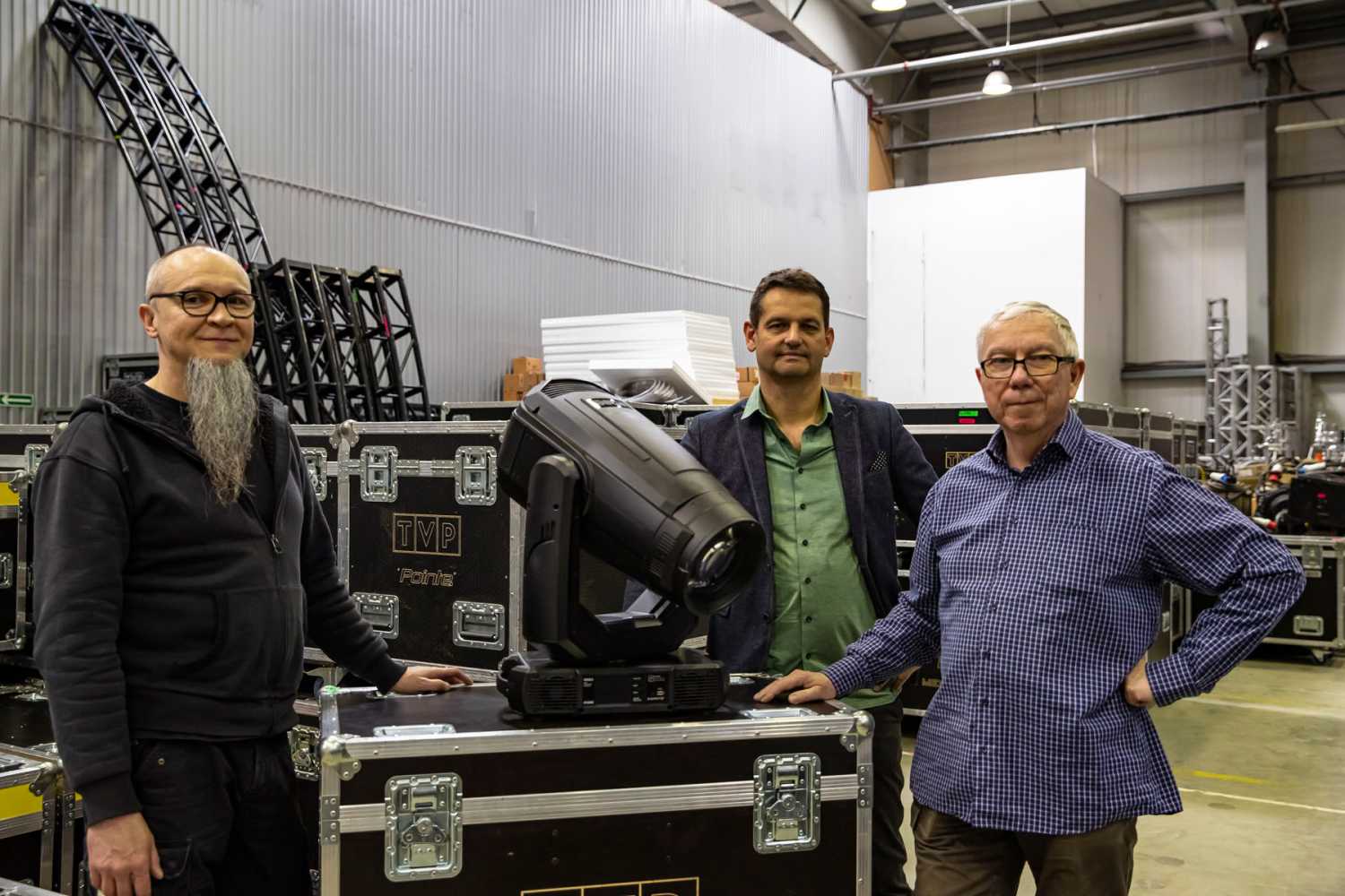 TVP’s Miro Madry (left) and Andrzej Jakubowski either side of Robe Polish distributor Prolight’s Rafal Rzeczkowski (photo: Louise Stickland)