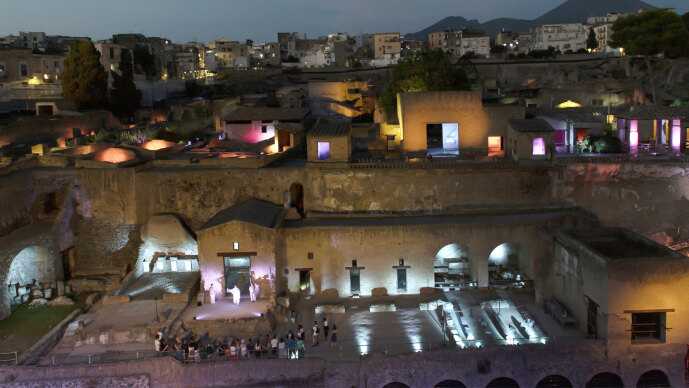 Prolights bathed the wide expanse of the Herculaneum excavations