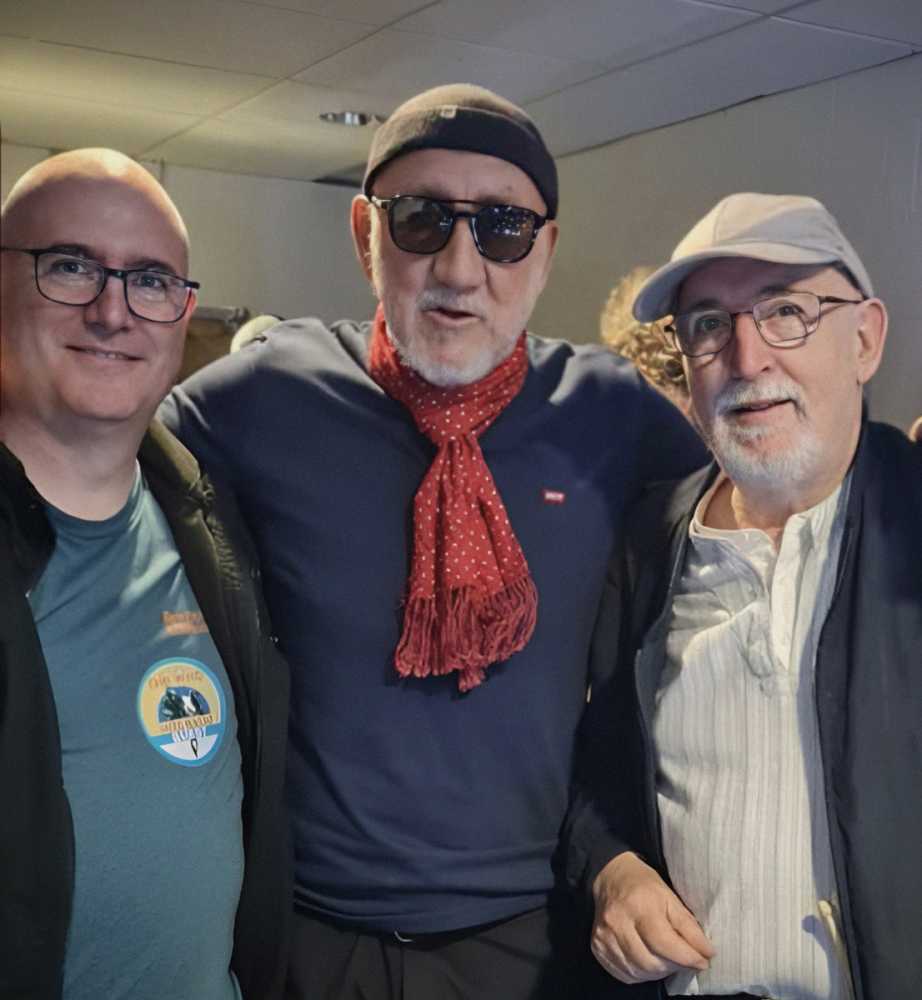 Iain Ogilvie (right) and his son John with Pete Townshend