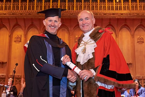 Hugh Vanstone receives his fellowship from Sheriff and Alderman Bronek Masojada (photo: Clive.Totman)